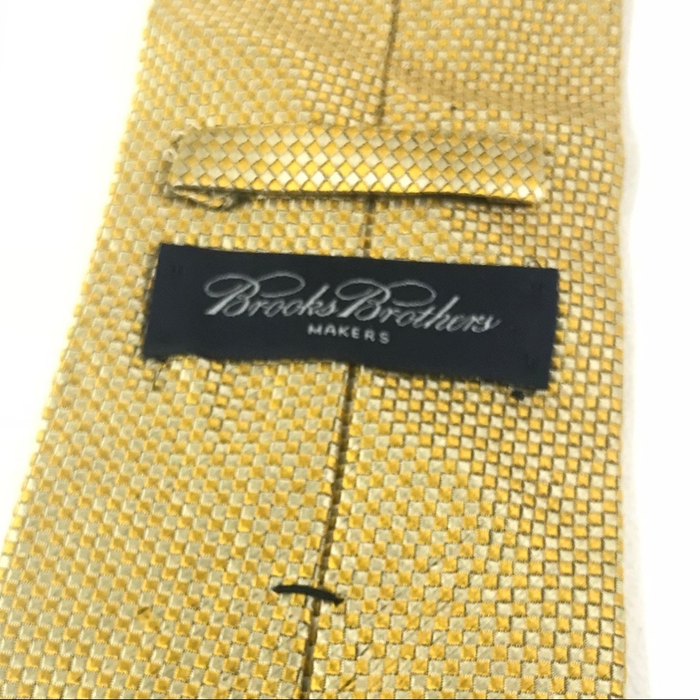 Gold tie by Brooks Brothers